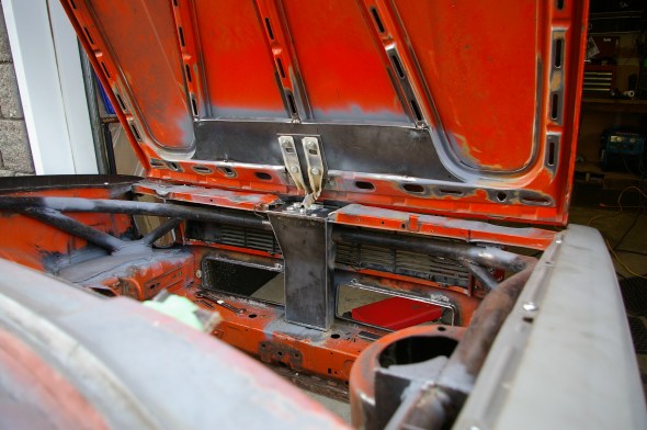 Forward opening hood.